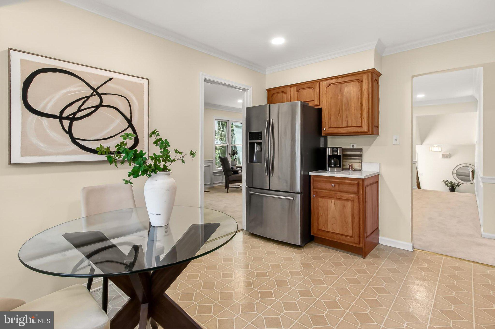 6908 Rochambeau Place Springfield, VA 22153 - Photo 20 of 70 Eating space in kit & stainless French door fridge