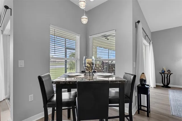a kitchen with a sink cabinets and stainless steel appliances