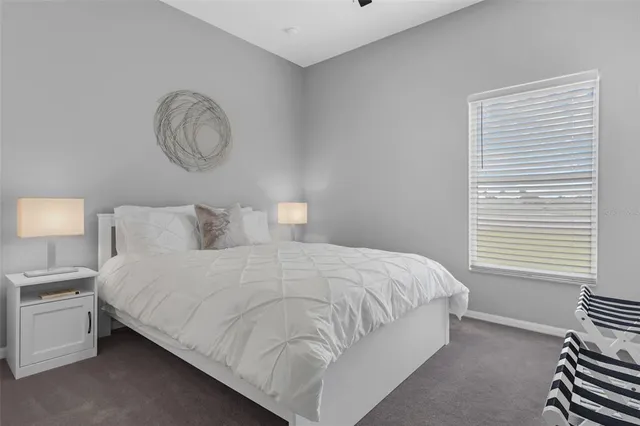 a view of a workspace with furniture window and wooden floor