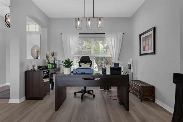 an aerial view of a city and lake view