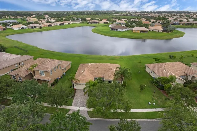 a view of a lake with a yard