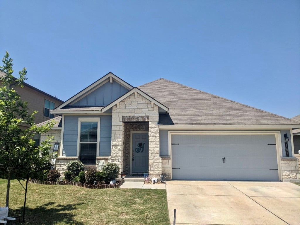 163 Beth Ann Loop Taylor, TX 76574 - Photo 1 of 1 a front view of a house with porch