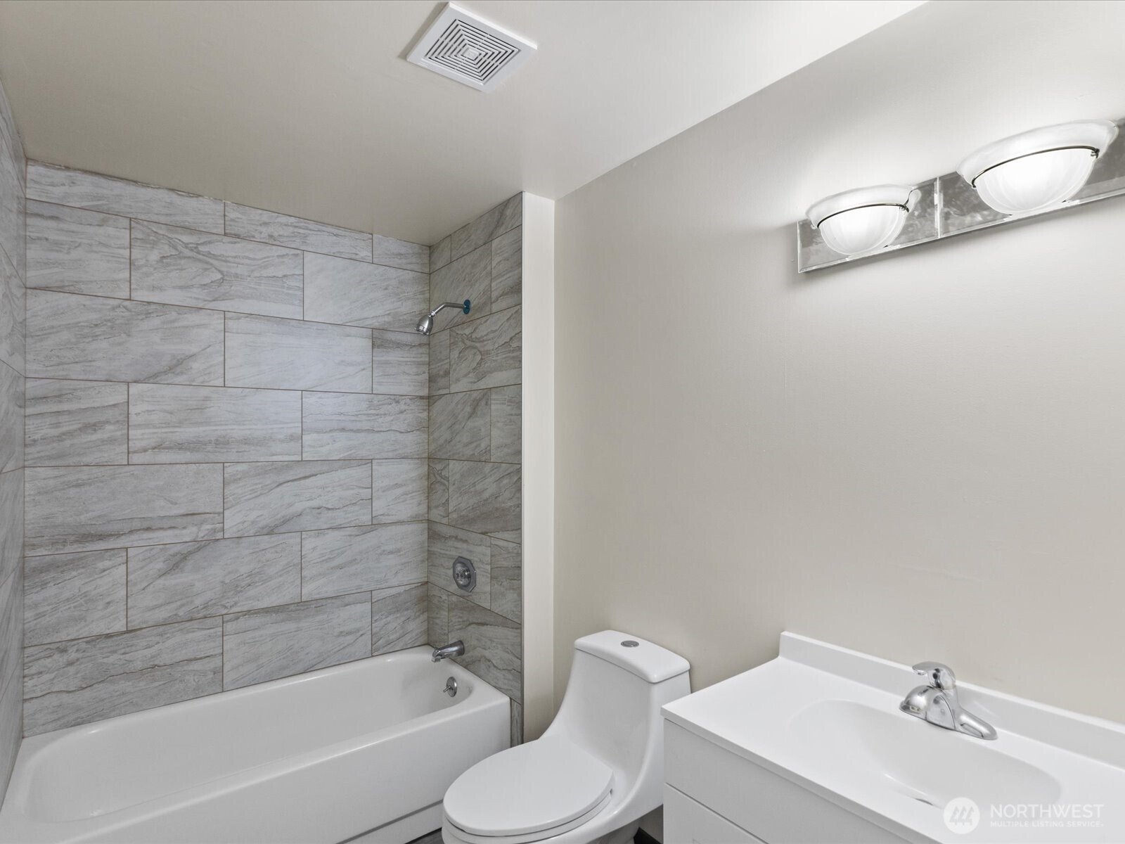 735 F Street Northeast Auburn, WA 98002 - Photo 23 of 31 a bathroom with a sink and a mirror