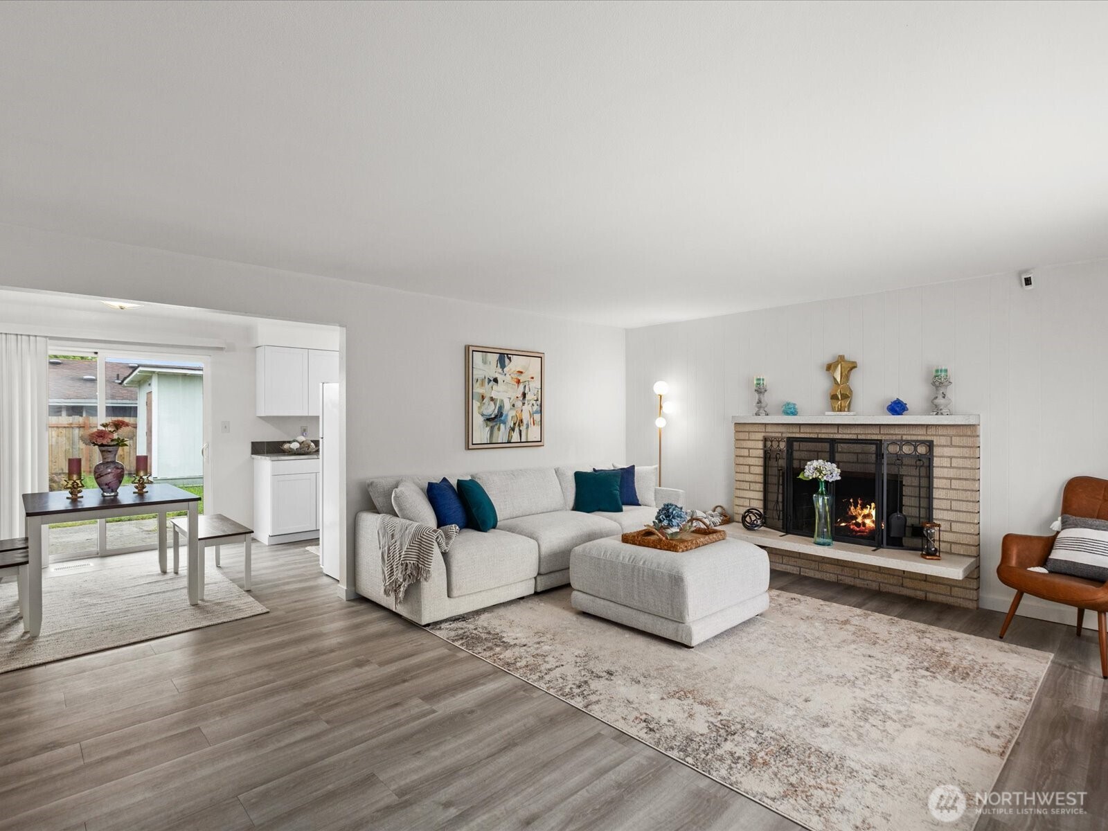 735 F Street Northeast Auburn, WA 98002 - Photo 5 of 31 a living room with furniture and a fireplace