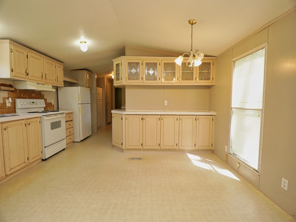 210 Floyd Street Boling, TX 77420 - Photo 15 of 29 a view of a kitchen with a sink