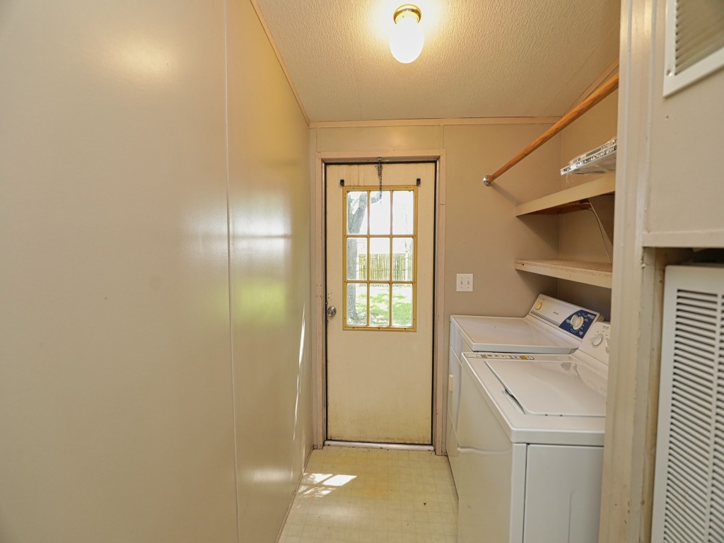 210 Floyd Street Boling, TX 77420 - Photo 18 of 29 a storage room with a washer and dryer