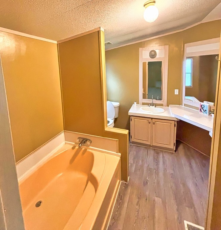 210 Floyd Street Boling, TX 77420 - Photo 21 of 29 a spacious bathroom with a tub and shower