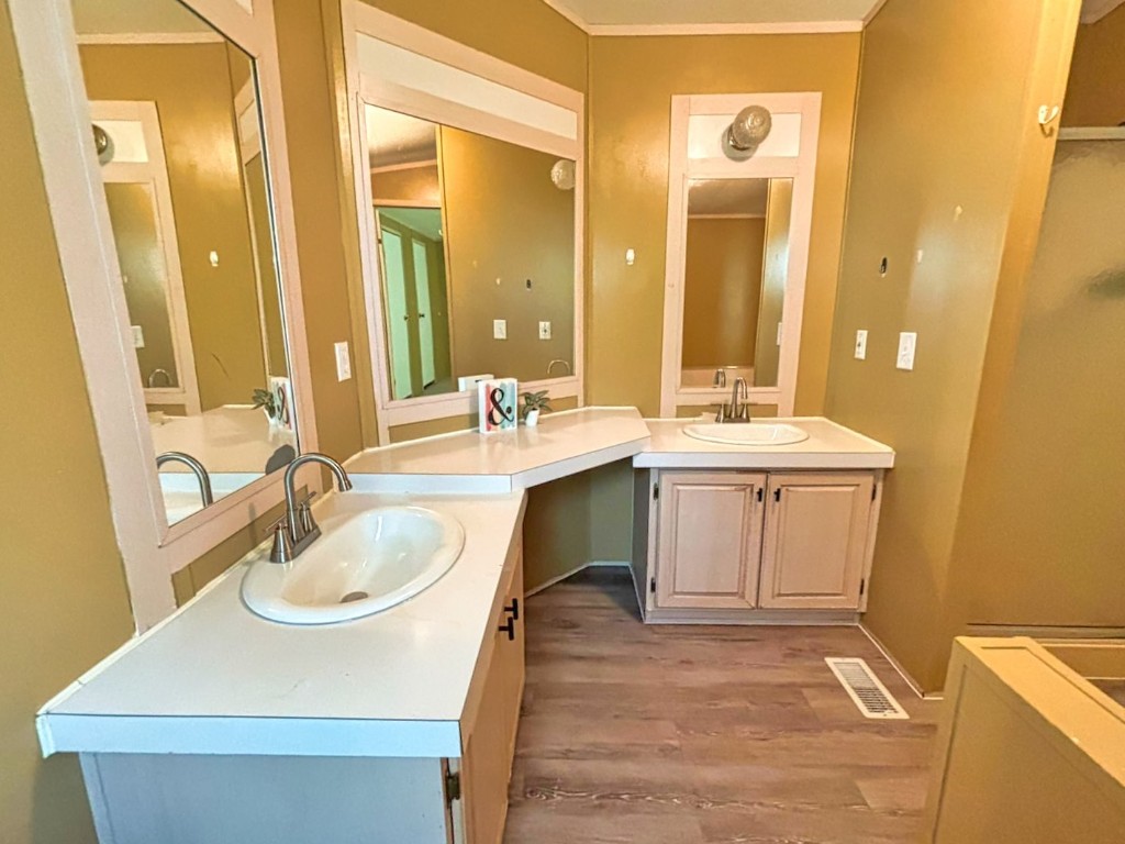 210 Floyd Street Boling, TX 77420 - Photo 22 of 29 a bathroom with a sink double vanity and a mirror