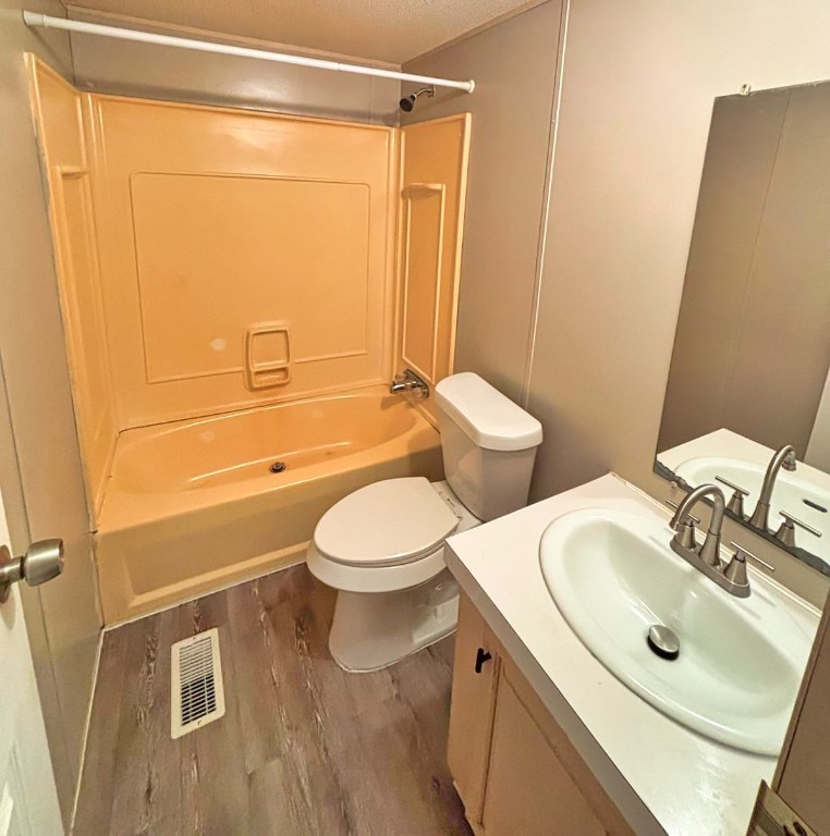 210 Floyd Street Boling, TX 77420 - Photo 26 of 29 a bathroom with a double vanity sink toilet and shower