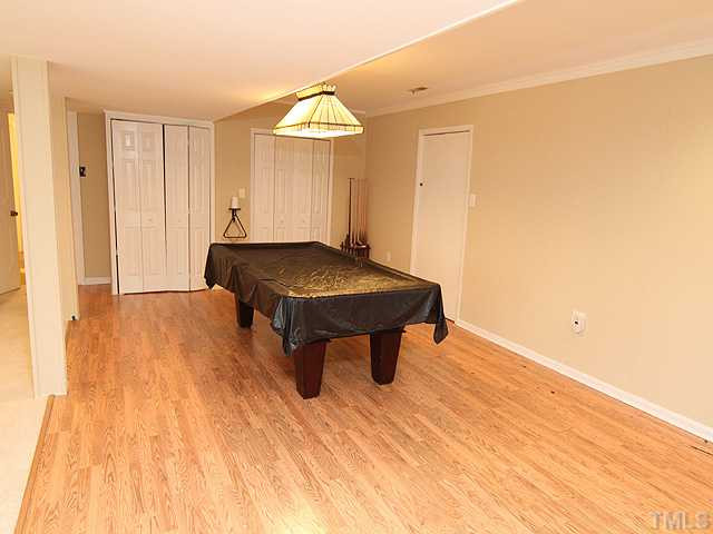 8644 Valley Brook Drive Raleigh, NC 27613 - Photo 11 of 18 REC ROOM: Pool anyone? This room opens to the family room!