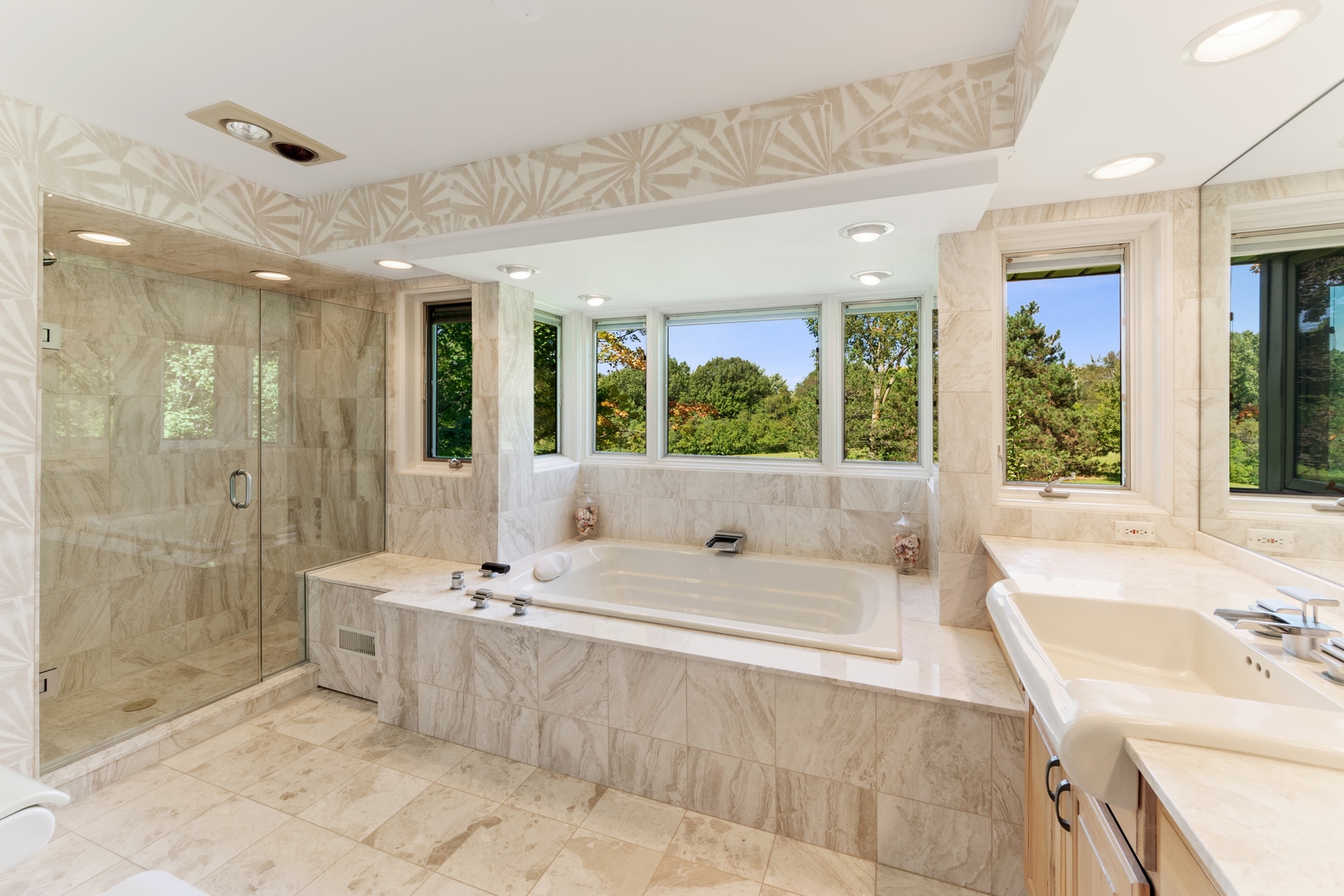 126 Brinker Road Barrington Hills, IL 60010 - Photo 17 of 31 a bathroom with a tub sink shower and mirror
