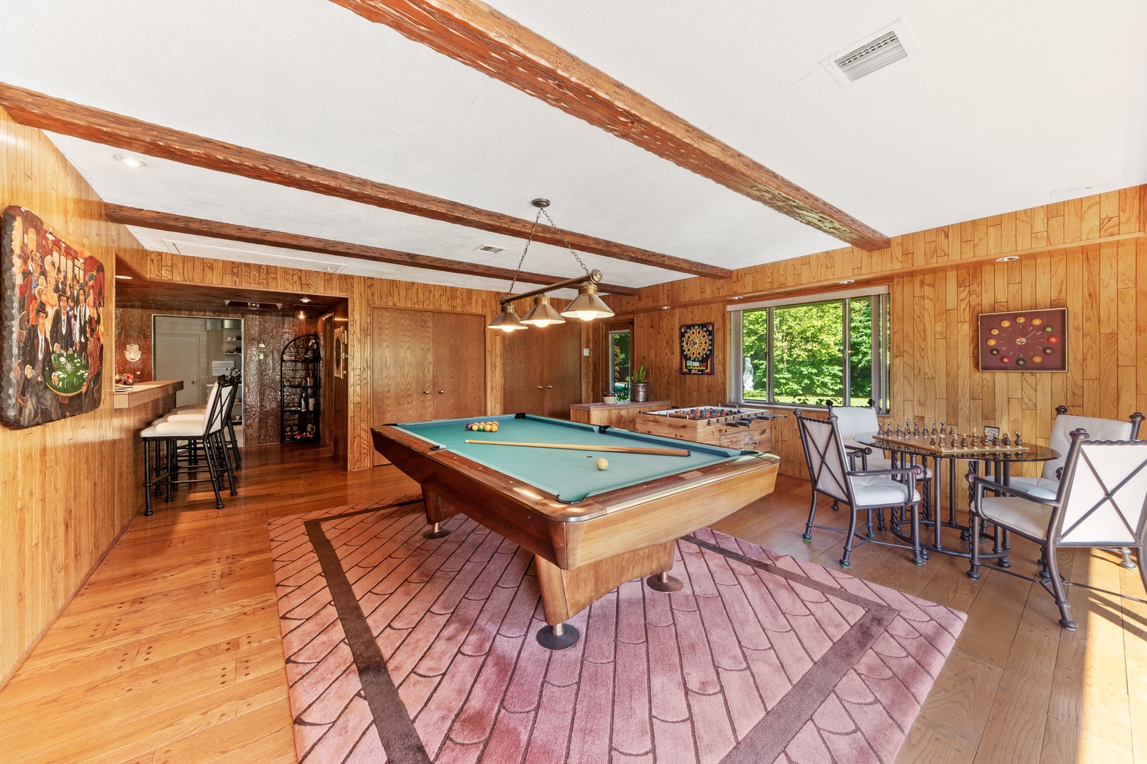 126 Brinker Road Barrington Hills, IL 60010 - Photo 26 of 31 a room with wooden floor pool table and chairs