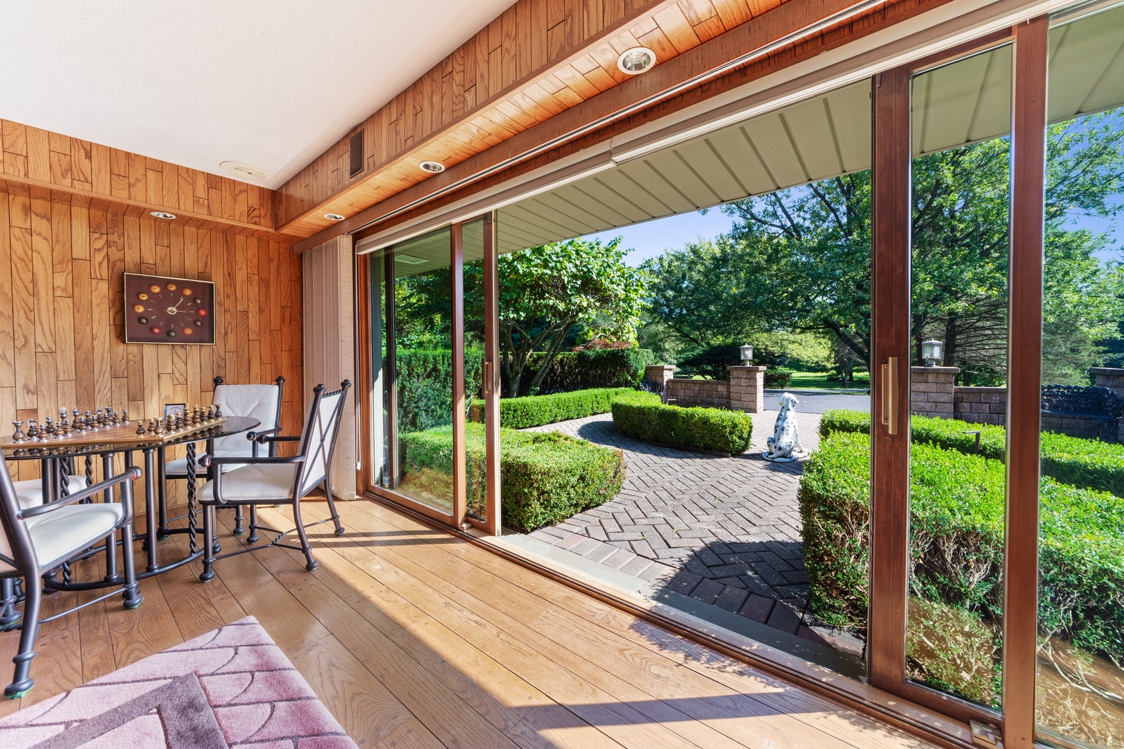 126 Brinker Road Barrington Hills, IL 60010 - Photo 27 of 31 a view of a porch with chairs and backyard