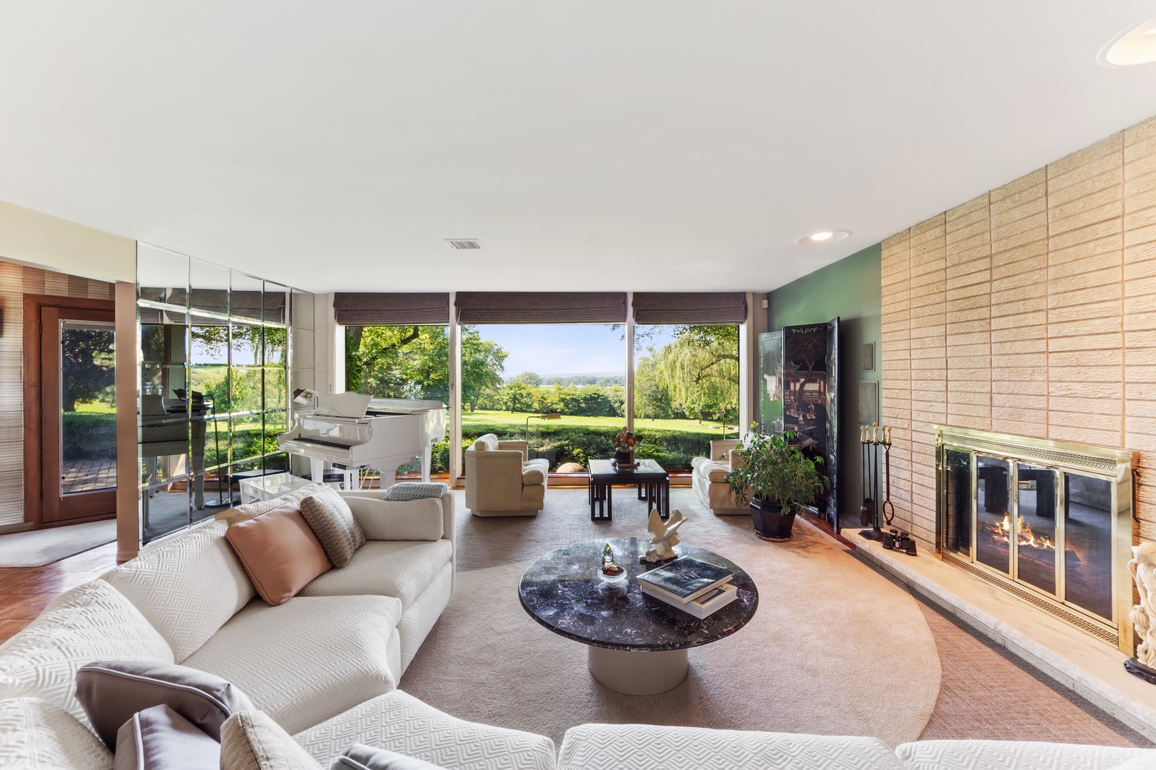 126 Brinker Road Barrington Hills, IL 60010 - Photo 4 of 31 a living room with furniture and a fireplace