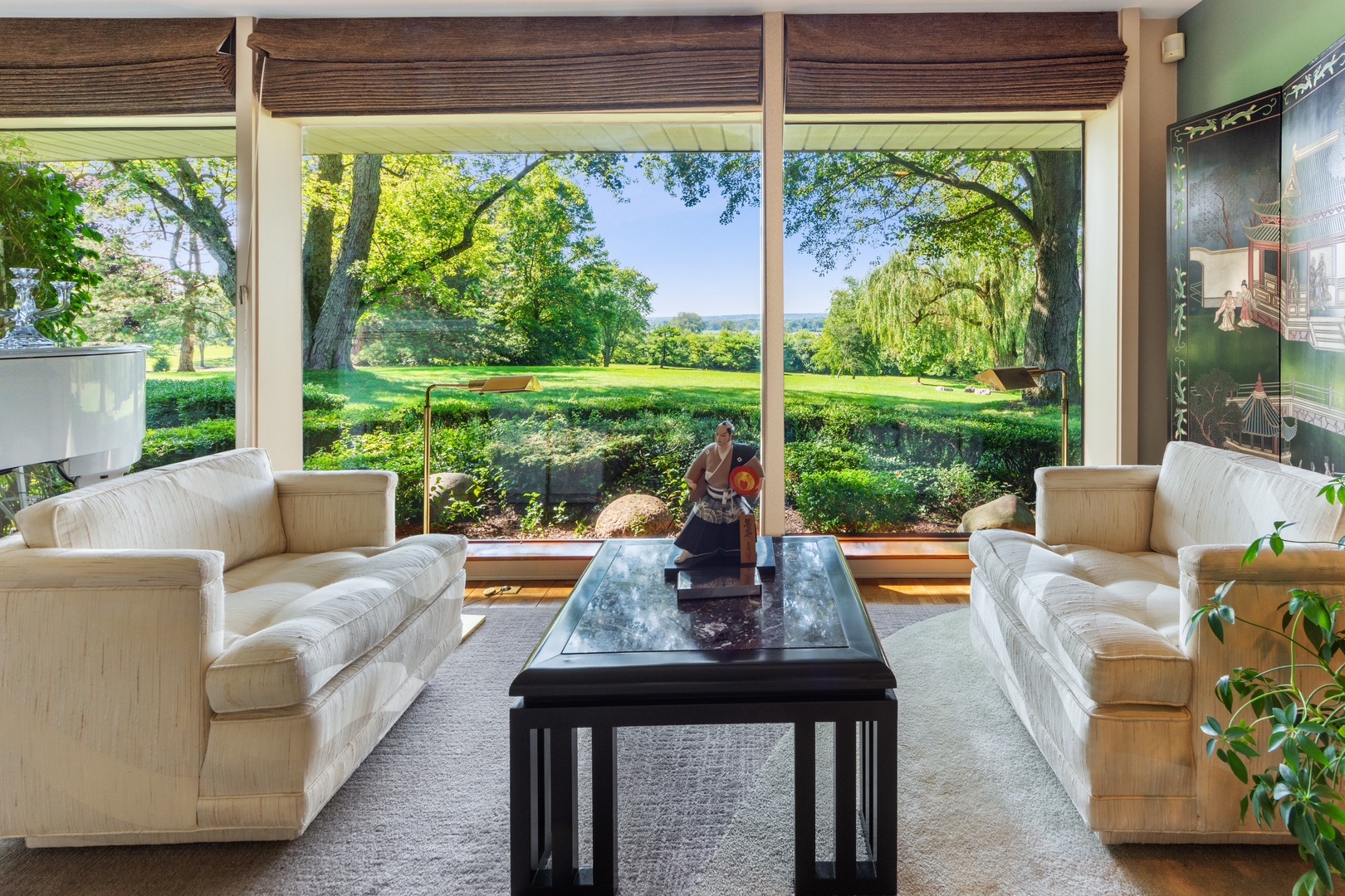 126 Brinker Road Barrington Hills, IL 60010 - Photo 5 of 31 a living room with patio furniture and a garden
