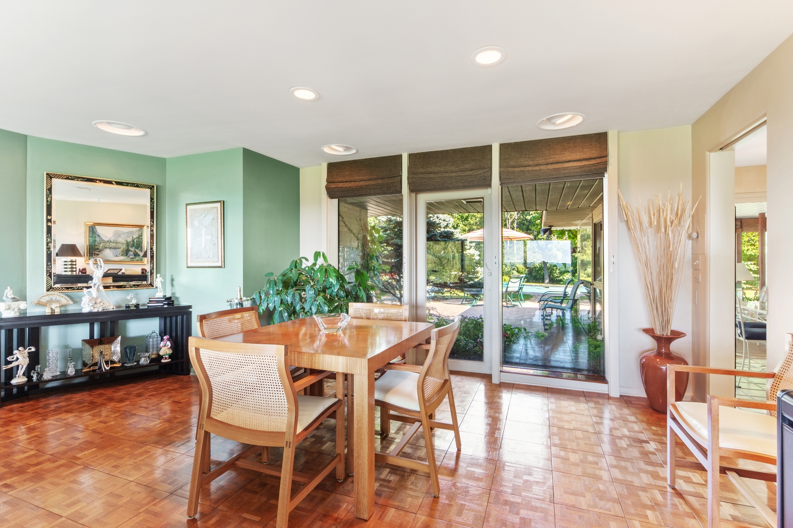 126 Brinker Road Barrington Hills, IL 60010 - Photo 9 of 31 a dining room with furniture and wooden floor