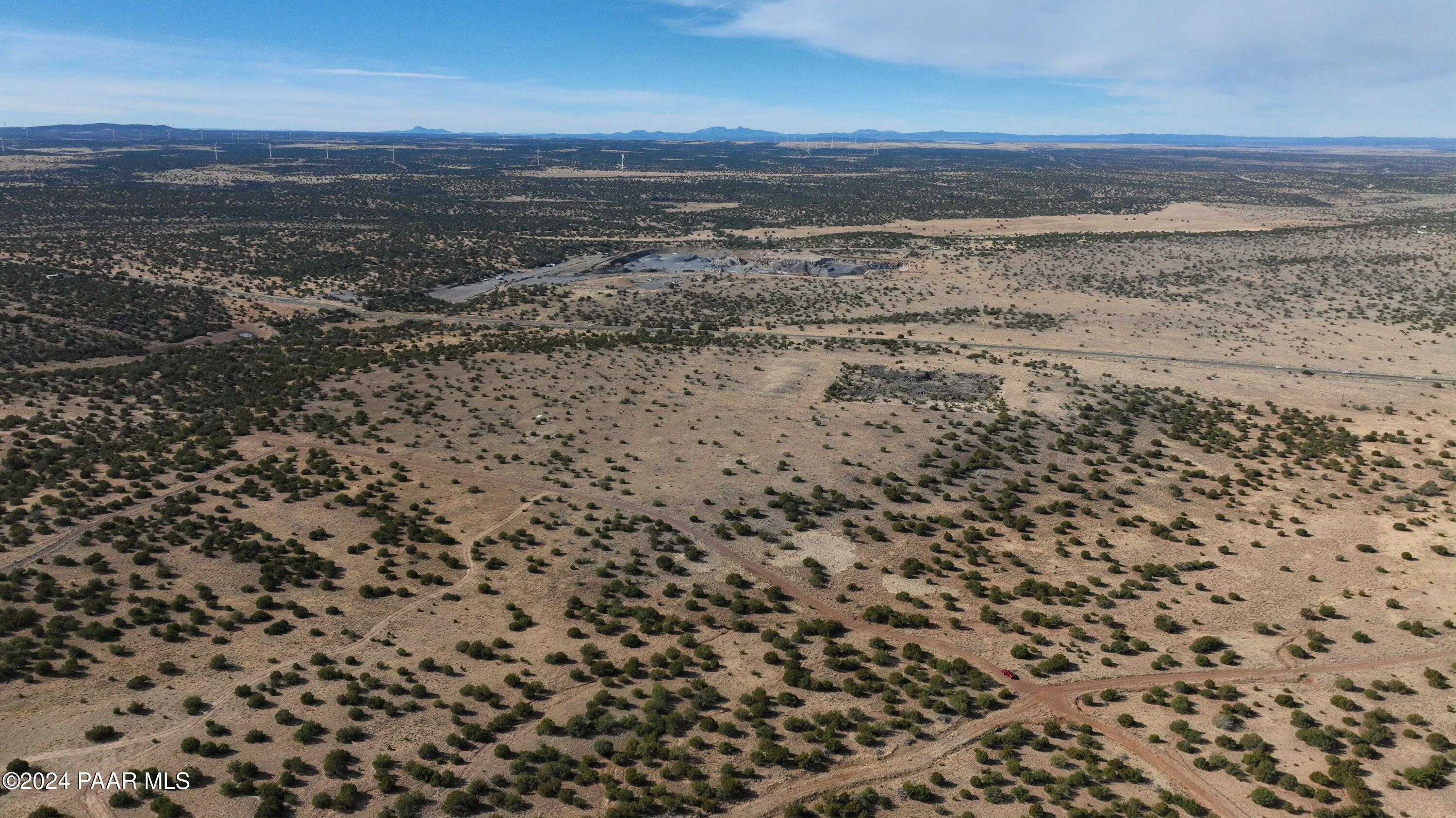 11646 Howard Mesa Loop Williams, AZ 86046 - Photo 4 of 27 a view of a room with wooden floor