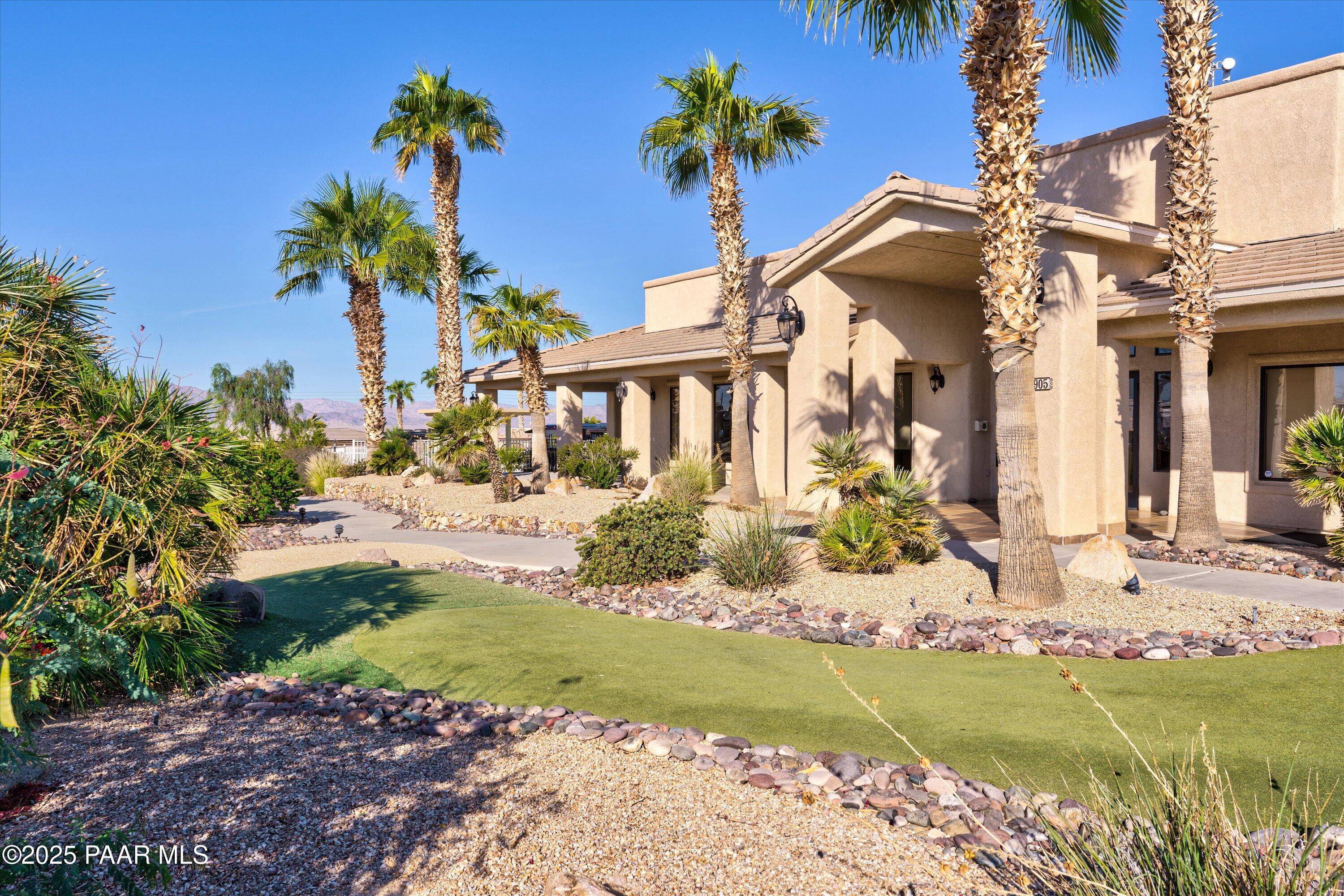 1905 Victoria Farms Road Lake Havasu City, AZ 86404 - Photo 18 of 22 a front view of a house with a yard