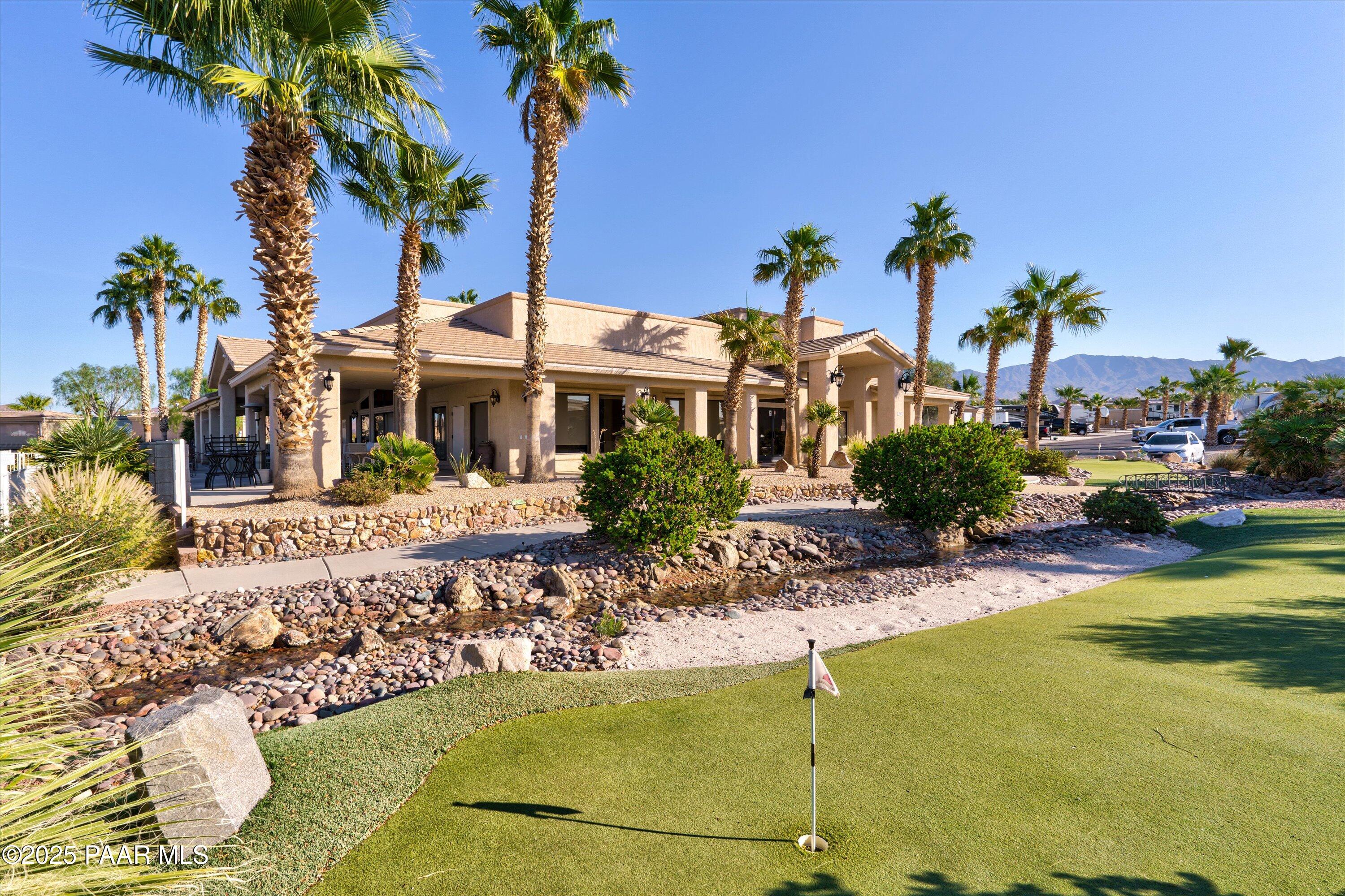 1905 Victoria Farms Road Lake Havasu City, AZ 86404 - Photo 19 of 22 a front view of a house with swimming pool