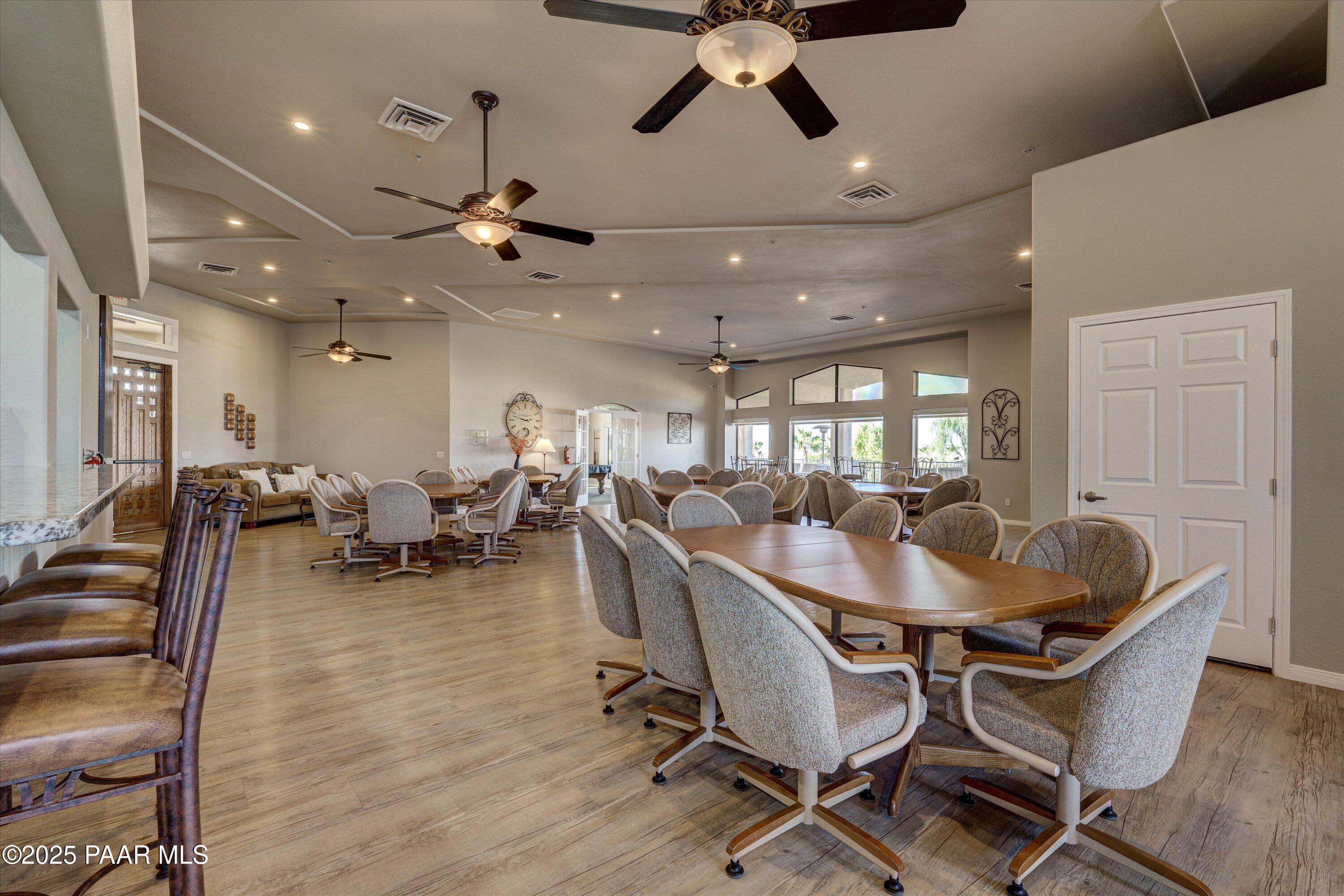 1905 Victoria Farms Road Lake Havasu City, AZ 86404 - Photo 20 of 22 a view of a dining room with furniture and chandelier