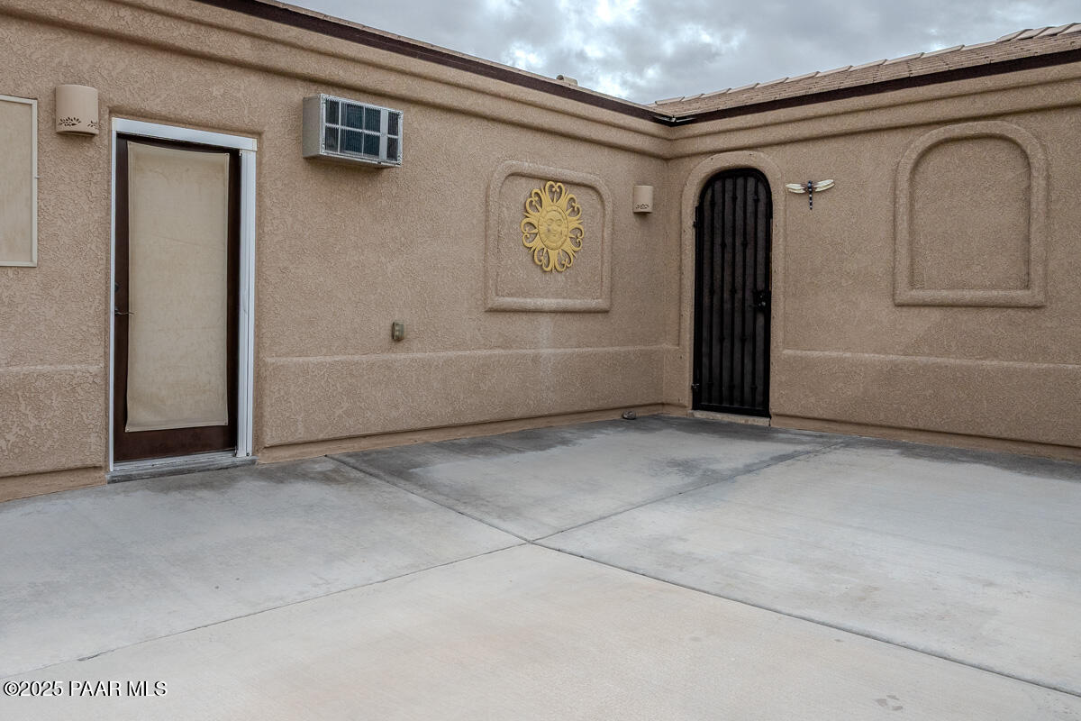 1905 Victoria Farms Road Lake Havasu City, AZ 86404 - Photo 3 of 22 a view of front door with hallway