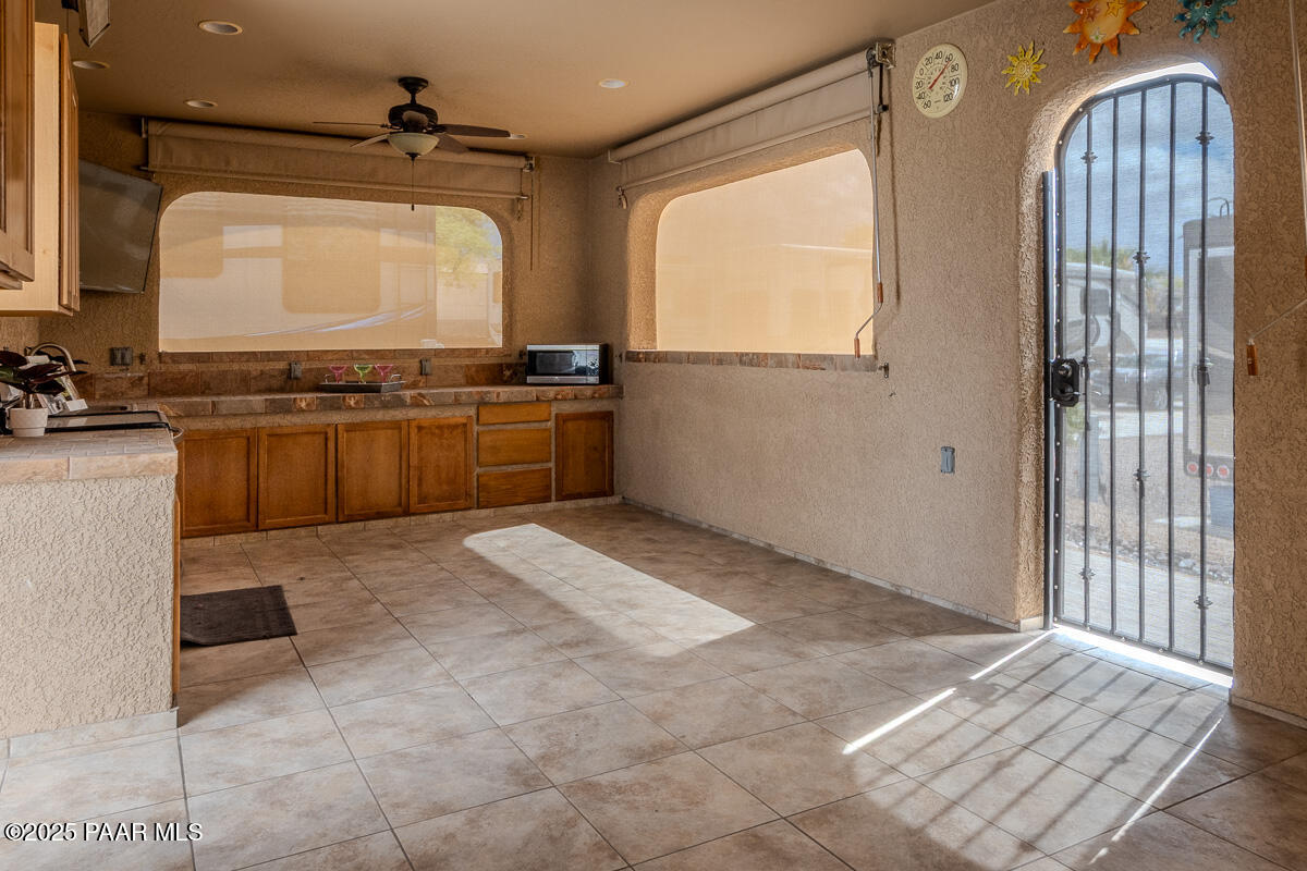 1905 Victoria Farms Road Lake Havasu City, AZ 86404 - Photo 6 of 22 a large bathroom with a granite countertop sink and a mirror