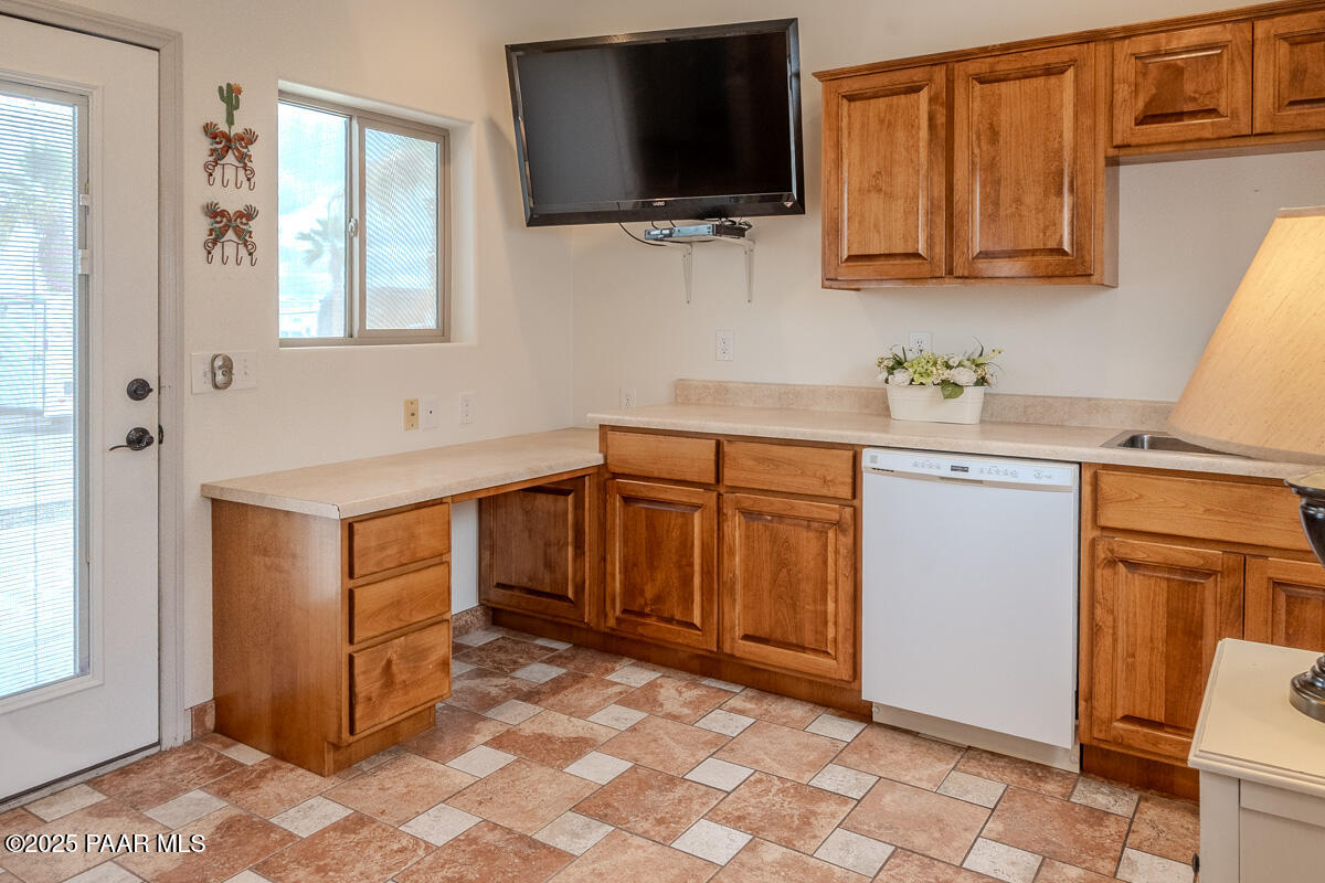 1905 Victoria Farms Road Lake Havasu City, AZ 86404 - Photo 10 of 22 a kitchen with a sink stove and microwave