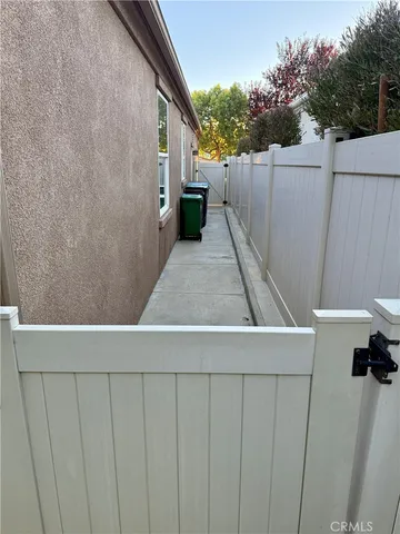 a view of outdoor space with wooden fence