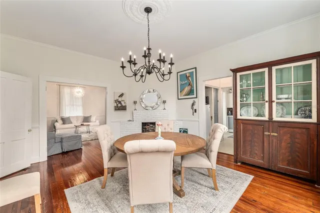 a kitchen with stainless steel appliances a sink stove and cabinets