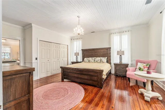 a view of a livingroom with an empty space and a fireplace