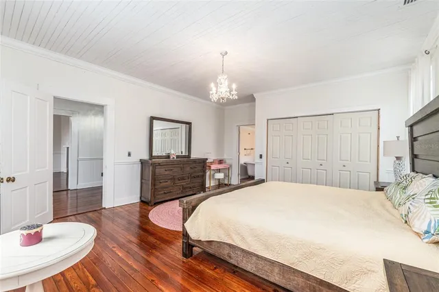 a view of livingroom with hardwood floor and a ceiling fan