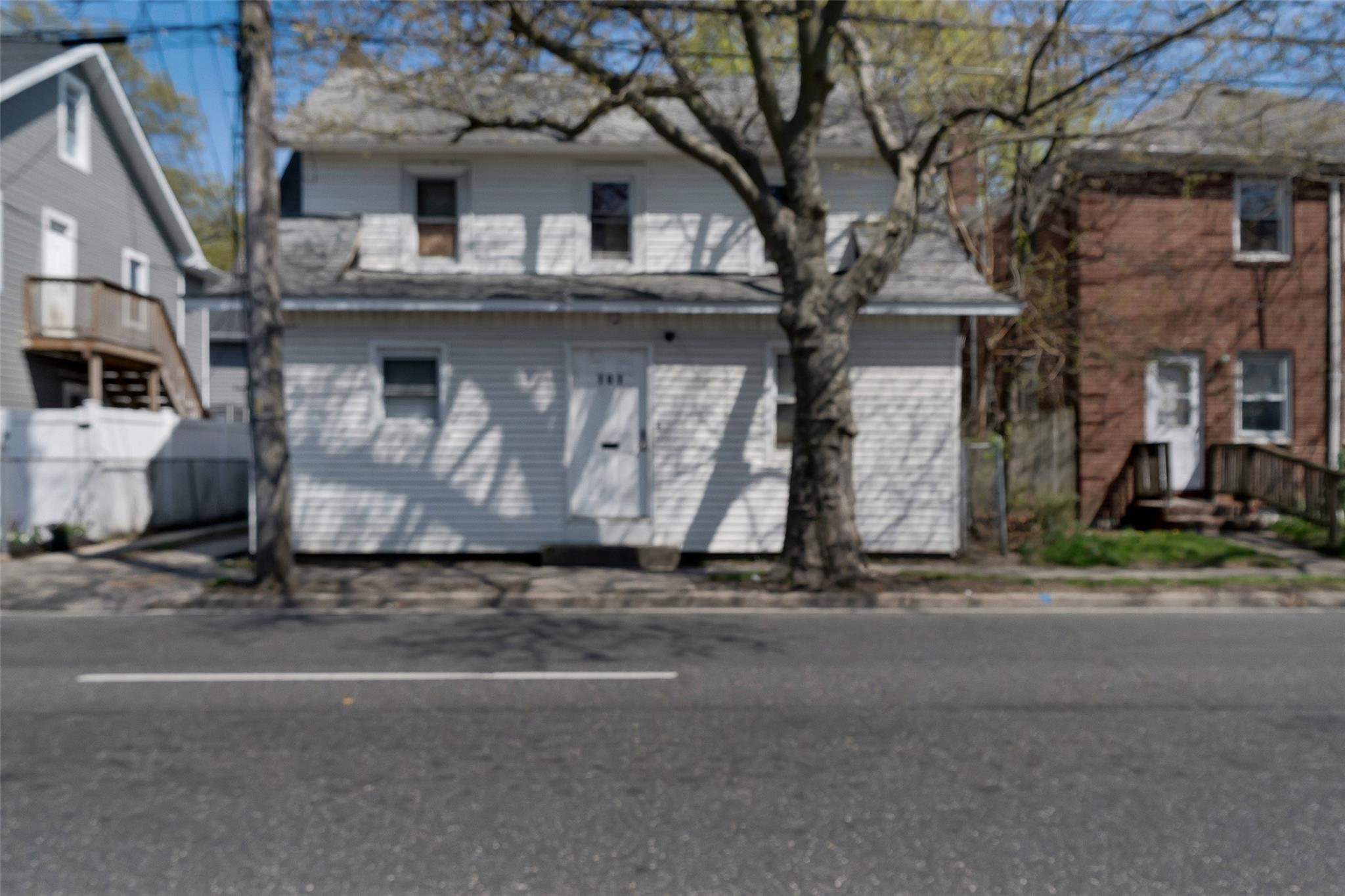 101 Baldwin Road Hempstead, NY 11550 - Photo 1 of 20 View of front of house with fence