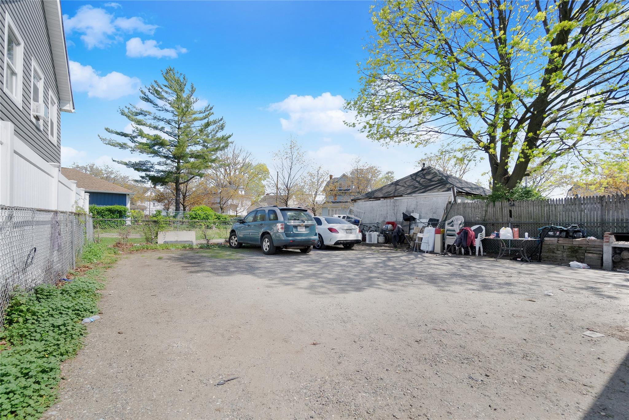 101 Baldwin Road Hempstead, NY 11550 - Photo 17 of 20 View of parking featuring fence
