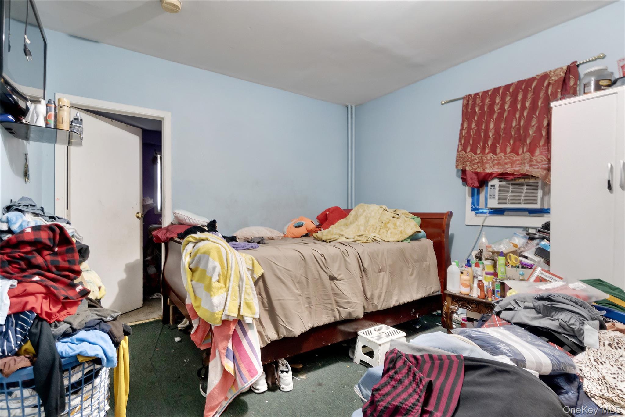 101 Baldwin Road Hempstead, NY 11550 - Photo 7 of 20 Bedroom with cooling unit and carpet