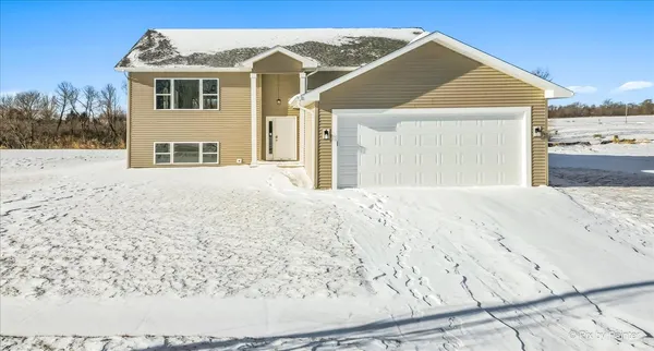a view of a house with a snow on the wall