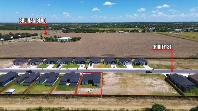 a view of swimming pool with outdoor seating
