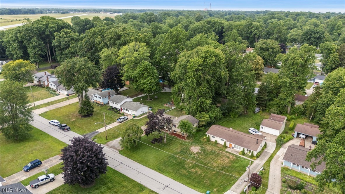 6472 Southgrove Road Mentor, OH 44060 - Photo 3 of 37 Aerial perspective of a residential street with mature tree canopies