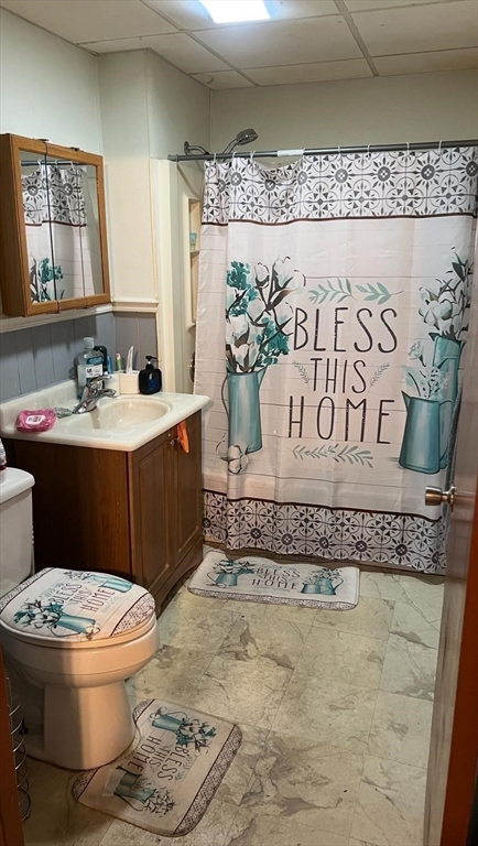 71 Fox Street Worcester, MA 01604 - Photo 16 of 21 a bathroom with a toilet sink and mirror