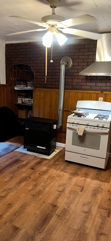 71 Fox Street Worcester, MA 01604 - Photo 19 of 21 a view of washer and dryer with wooden floor