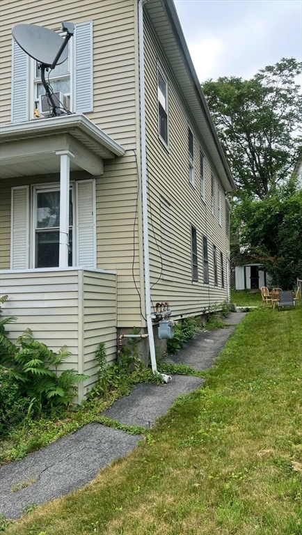 71 Fox Street Worcester, MA 01604 - Photo 2 of 21 a view of a house with a yard