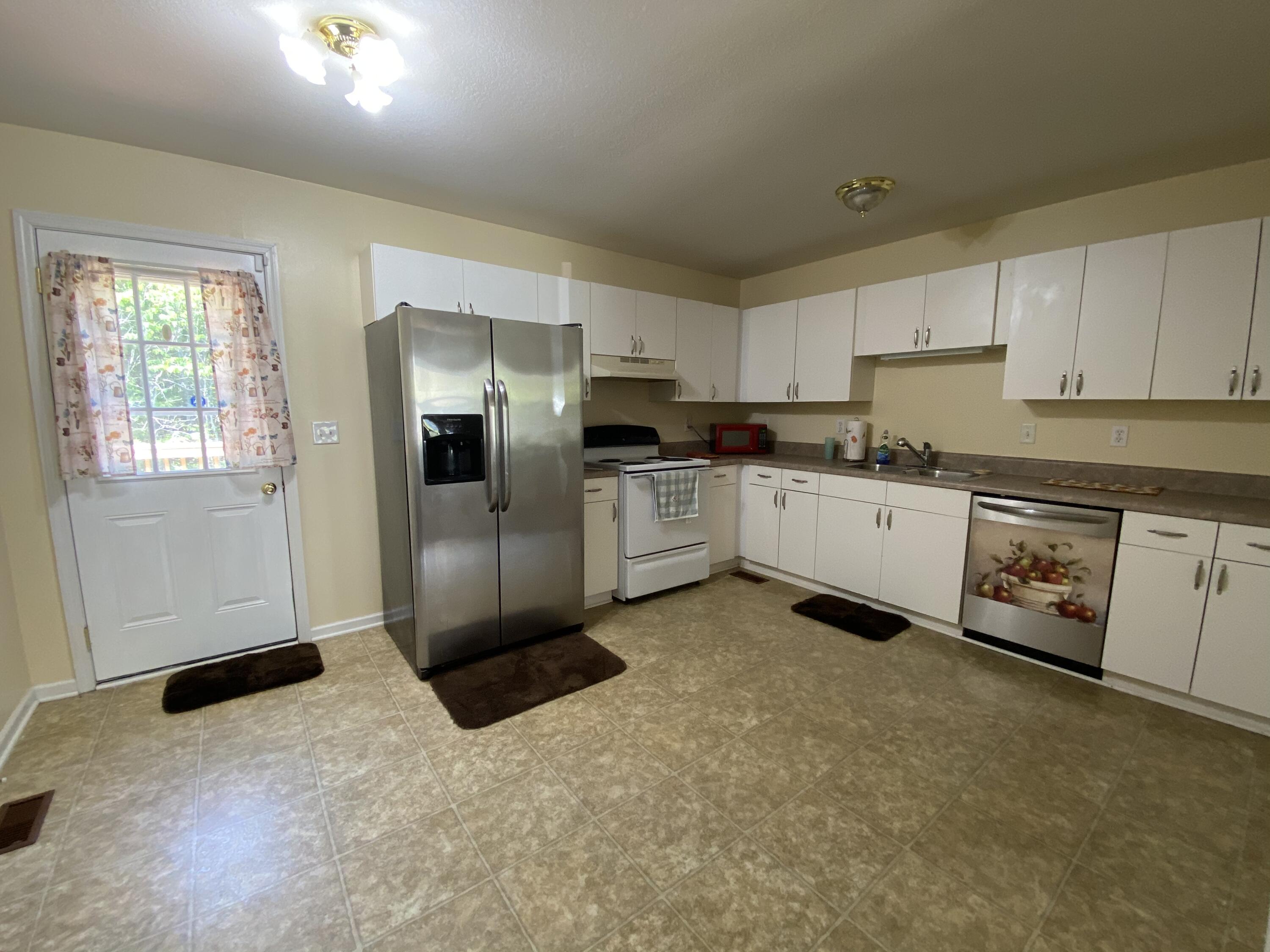 192 Sandy Hill Road La Follette, TN 37766 - Photo 6 of 17 B4D2D579-AE2D-452B-B3E4-7911170E11AB