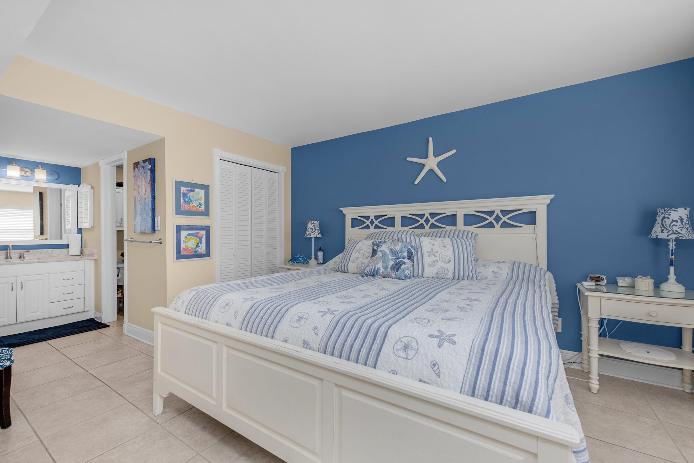 909 Santa Rosa Boulevard, Unit 241 Fort Walton Beach, FL 32548 - Photo 12 of 28 a bedroom with a bed and a cabinets