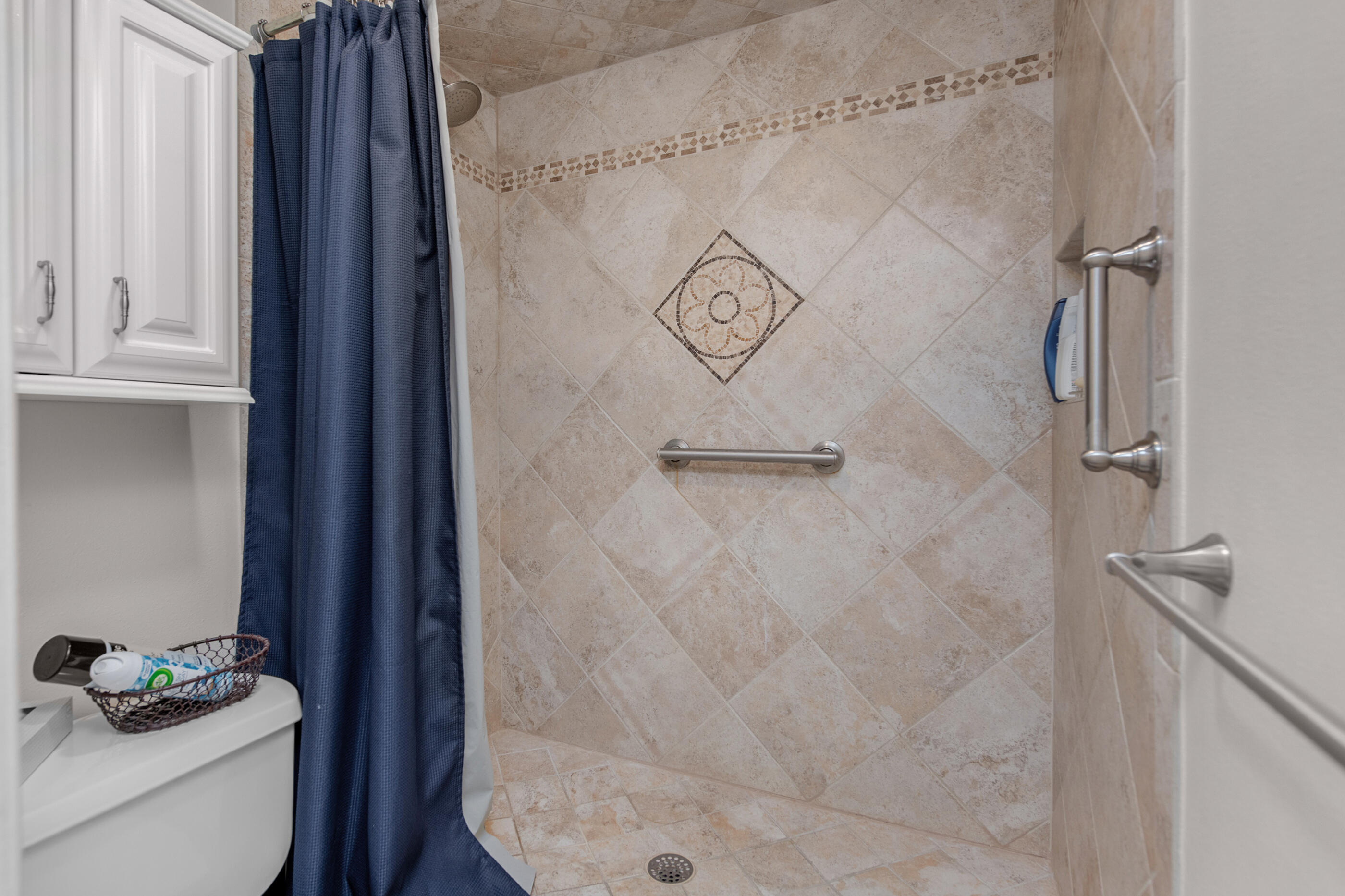 909 Santa Rosa Boulevard, Unit 241 Fort Walton Beach, FL 32548 - Photo 17 of 28 a bathroom with a shower toilet and sink
