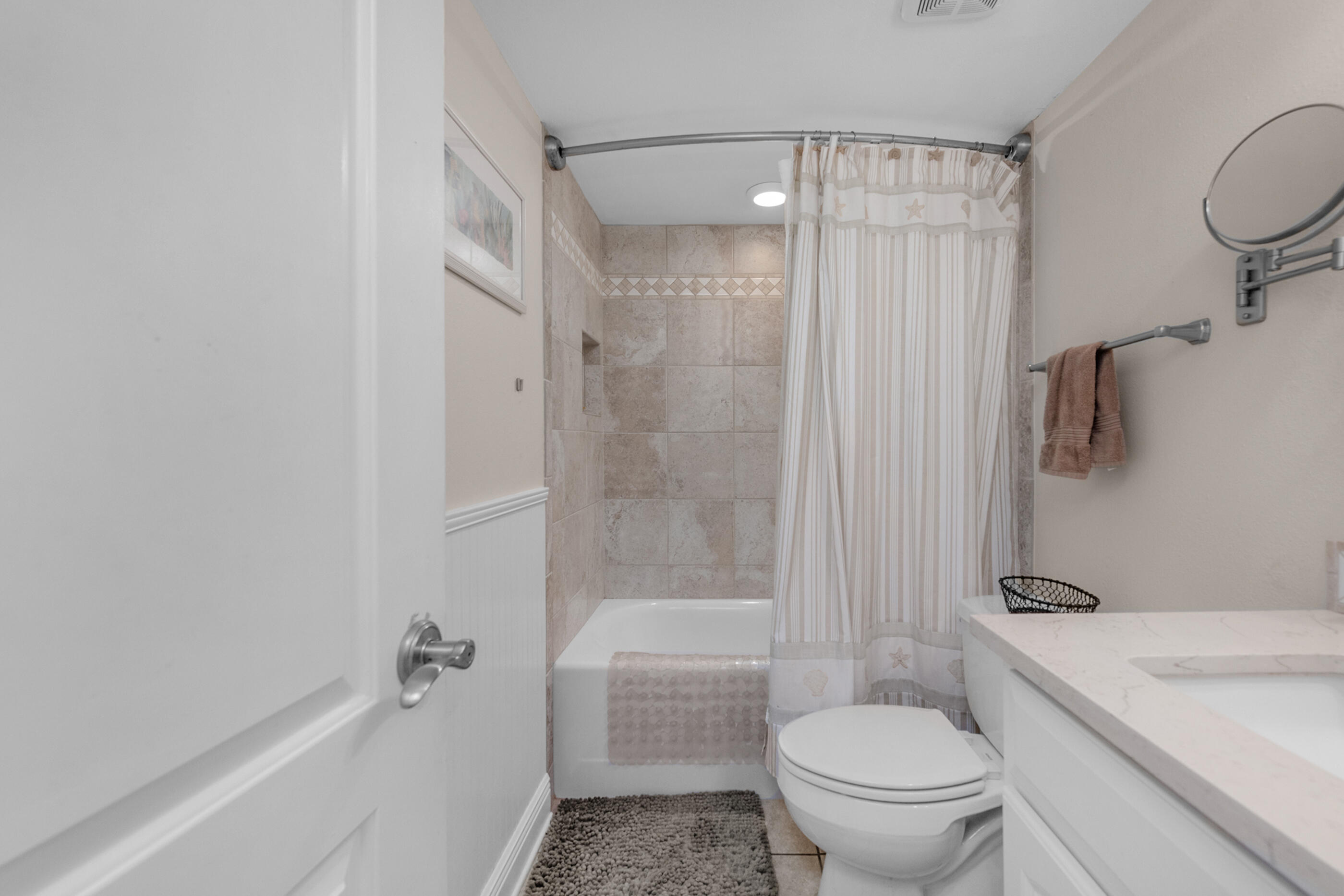 909 Santa Rosa Boulevard, Unit 241 Fort Walton Beach, FL 32548 - Photo 21 of 28 a bathroom with a sink toilet and shower