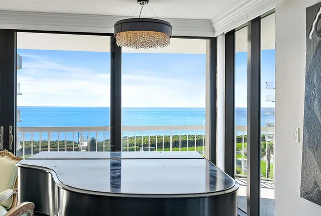 a living room with furniture and white walls