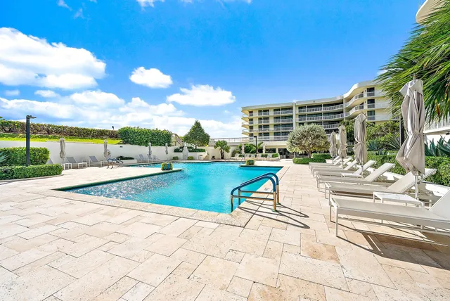 a view of a lake with a building in the background