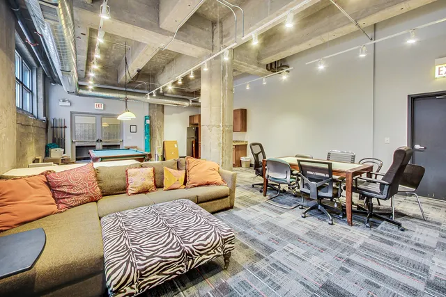 a view of a building with large trees