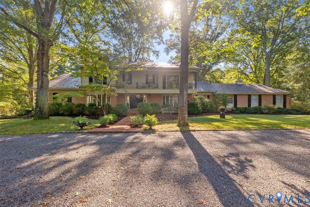 a view of a house with swimming pool and porch with furniture