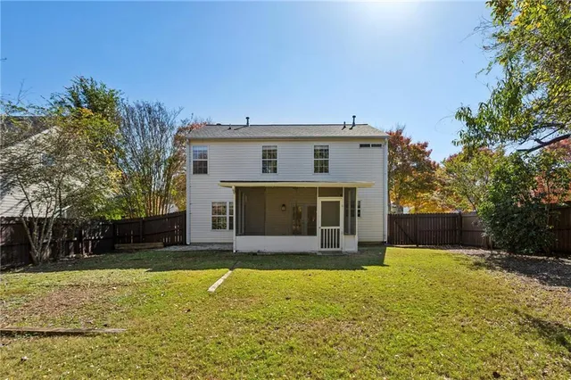 a view of a yard with trees