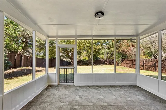 a view of a large room with a large window